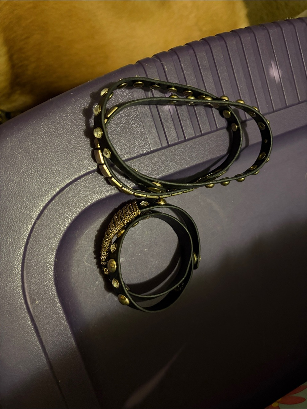 2 black and gold wrap bracelets